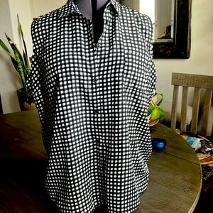 George black and white sleeveless blouse.